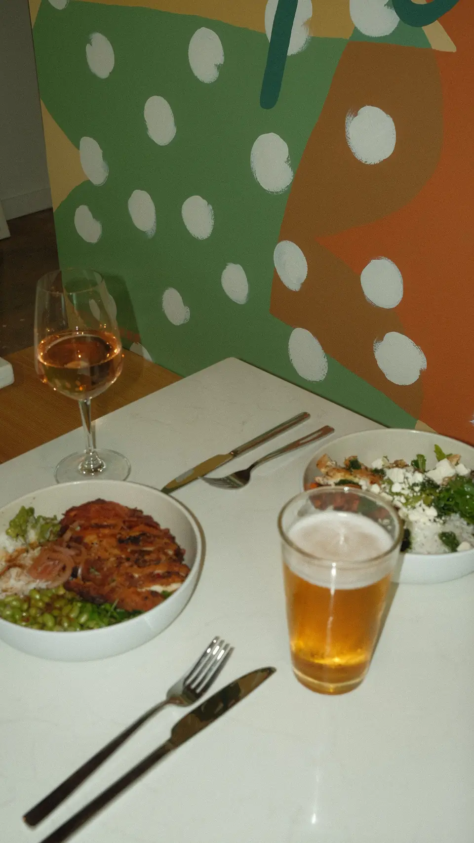 Lunch and a cold beer by the polka dot mural