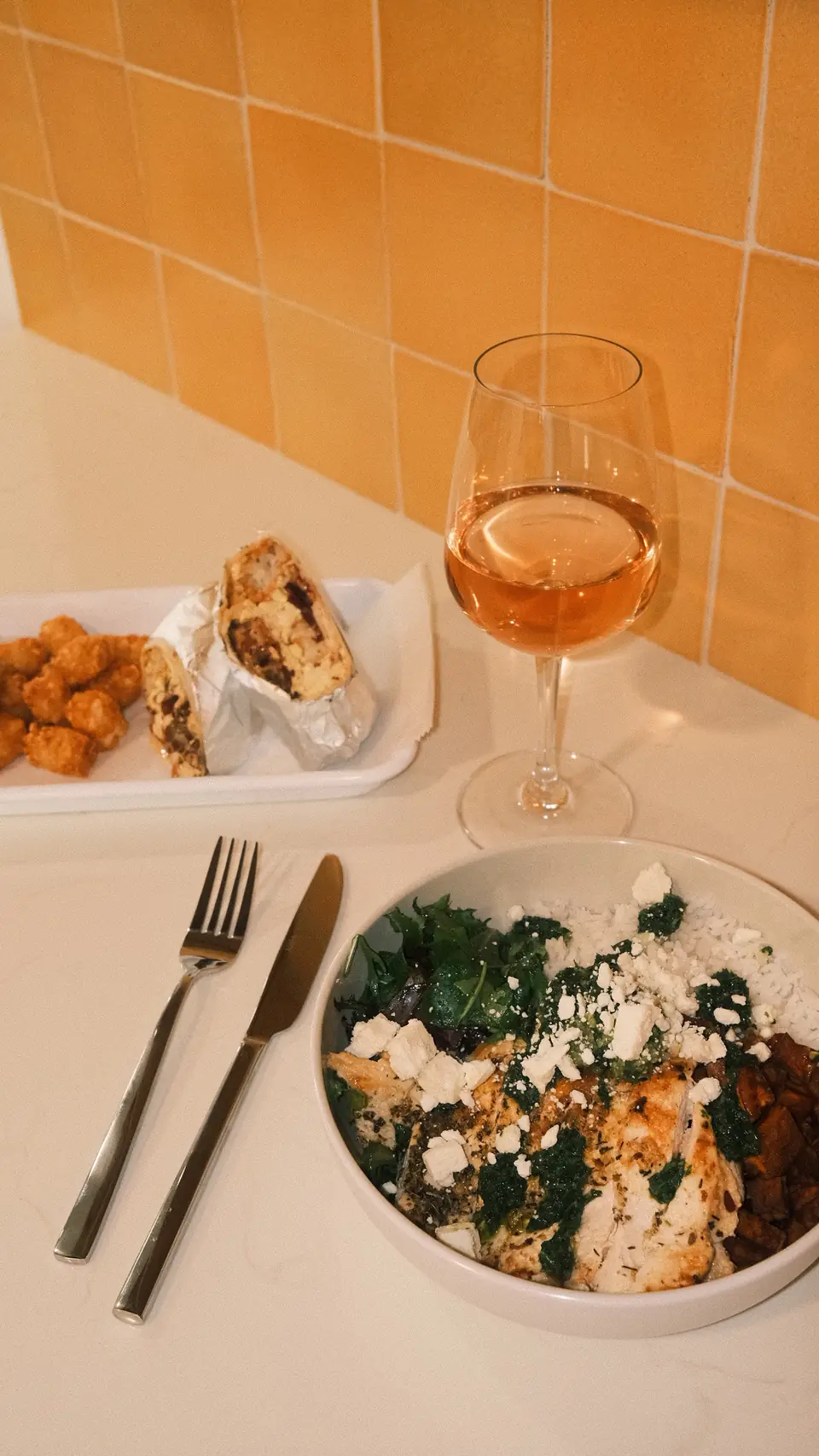 Lunch and rosé on the orange tile counter